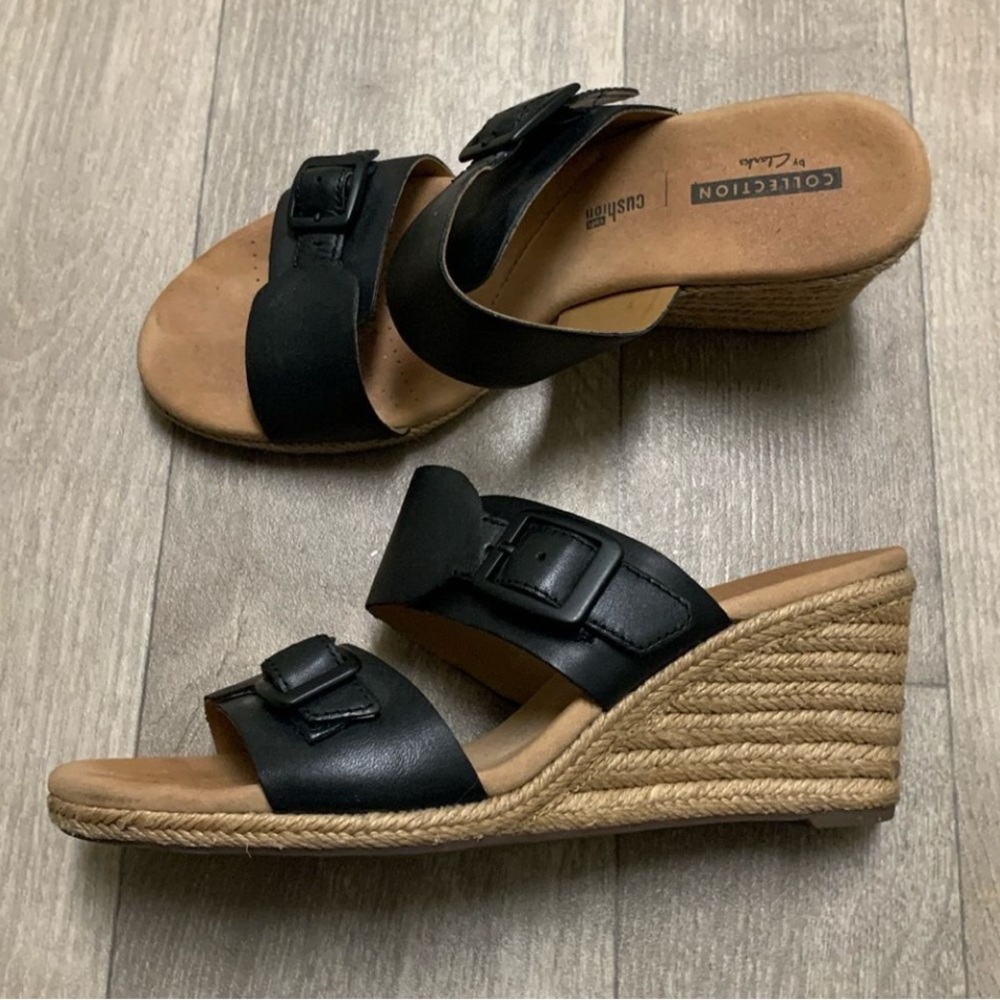 “COLLECTION By CLARKS” Black Leather Wedge Slides.
Size 7  EUC